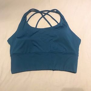 Cute turquoise sports bra with back cross design (Size L) NEW! Never used!